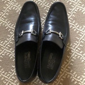 Men’s black Ferragamo loafers.